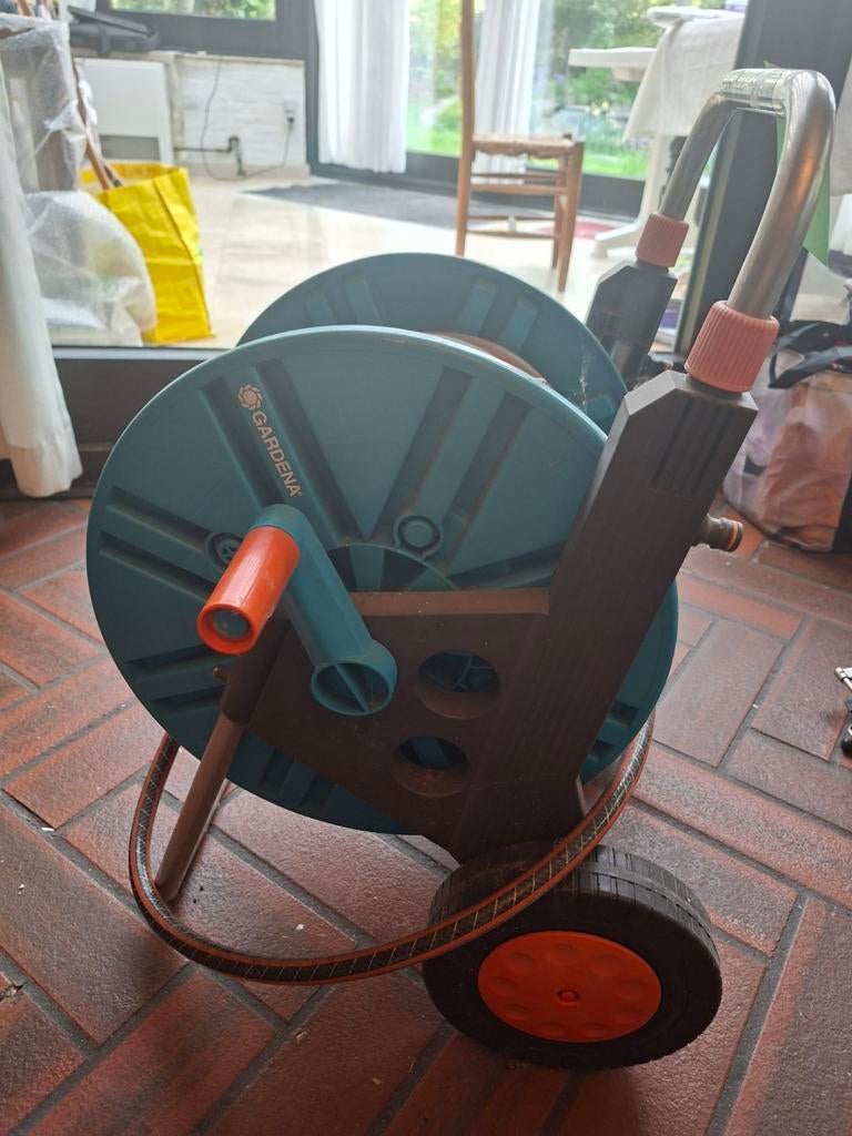 Gardena tuinslang, Ophalen