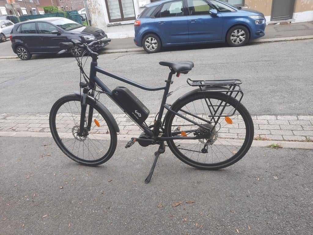Velo électrique 750W moteur central, Ophalen, Zo goed als nieuw, 50 km per accu of meer, Overige merken