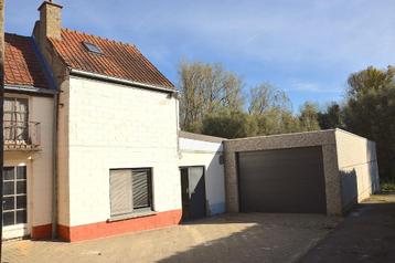 GEDEELTELIJK TE RENOVEREN WONING MET RUIME GARAGE EN TUIN beschikbaar voor biedingen