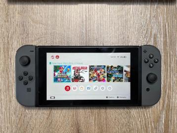 Nintendo Switch 2020 (v2) + boîte + Carte SD 128gb + 1jeu disponible aux enchères