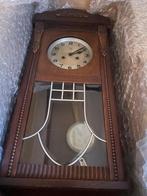 Pendule klok, Ophalen