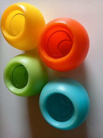 Originele, kleurrijke theelichthouders in was beschikbaar voor biedingen