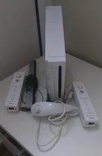 Wii console+stuur+2 controllers+1 nucknuck+7 spellen, Ophalen of Verzenden, Zo goed als nieuw, Met 3 controllers of meer, Met games