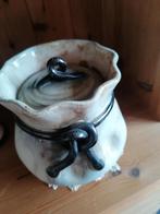 stenen oude pot, Ophalen