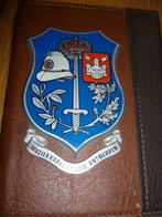 POLITIE EMBLEEM, Enlèvement