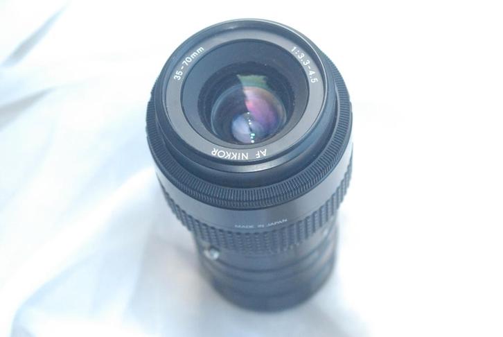 Nikon af 35-70 mm 3.3-4.5 + 3 bagues macros, TV, Hi-fi & Vidéo, Appareils photo analogiques, Utilisé, Reflex miroir, Nikon, Enlèvement ou Envoi