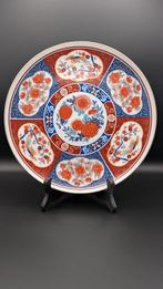 Imari porseleinen bord uit Japan, Enlèvement