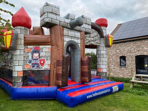 Ridderspringkasteel met grote glijbaan te huur, Hobby en Vrije tijd, Feestartikelen | Verhuur, Verzenden