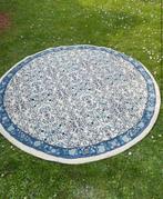 Tapis rond fait main Tunisie, Enlèvement, Utilisé