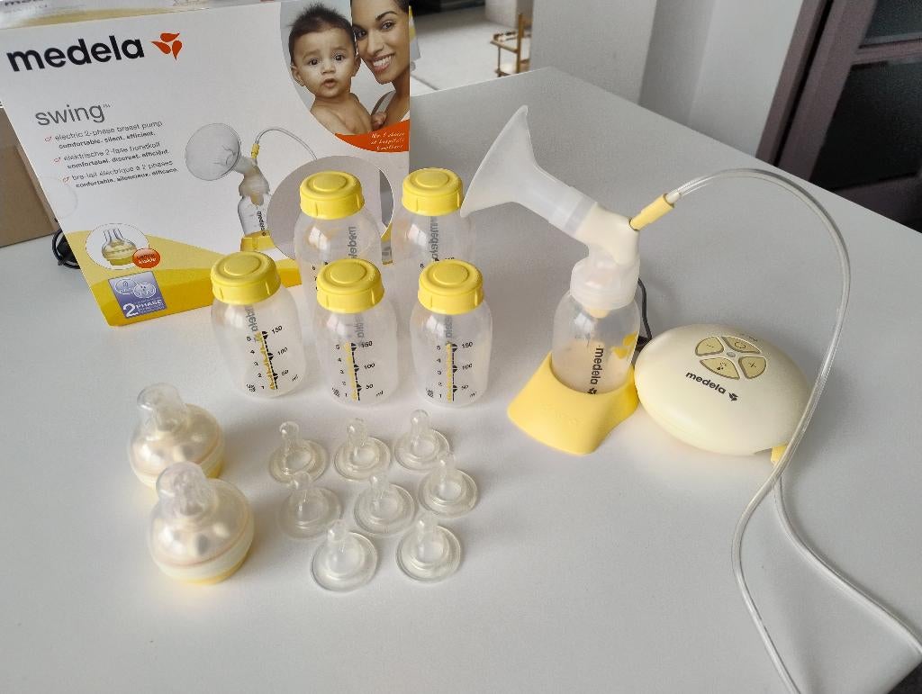 Medela Swing borstkolf set + 2 calma's + 6 flessen, Kinderen en Baby's, Babyvoeding en Toebehoren, Gebruikt, Borstkolf, Ophalen of Verzenden