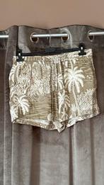 Short van H&M maat 42, Ophalen of Verzenden, Zo goed als nieuw, Maat 42/44 (L)