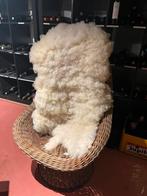 Rotanstoel met schapenvacht, Ophalen