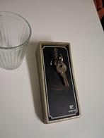 Sleutelschakelaar, drukknop met braakbeveiliging., Ophalen