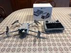 Dji mini 3 + rc controller, Audio, Tv en Foto, Drones, Ophalen, Zo goed als nieuw, Drone met camera