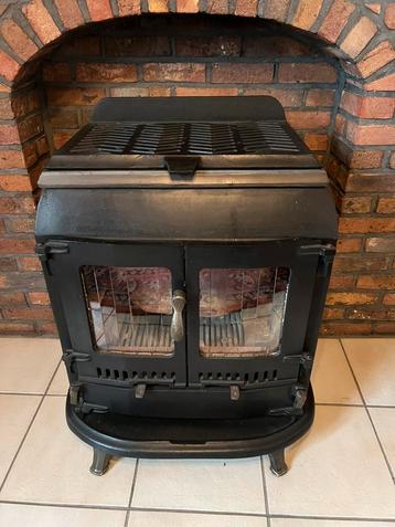 Kolenkachel met thermostaat beschikbaar voor biedingen