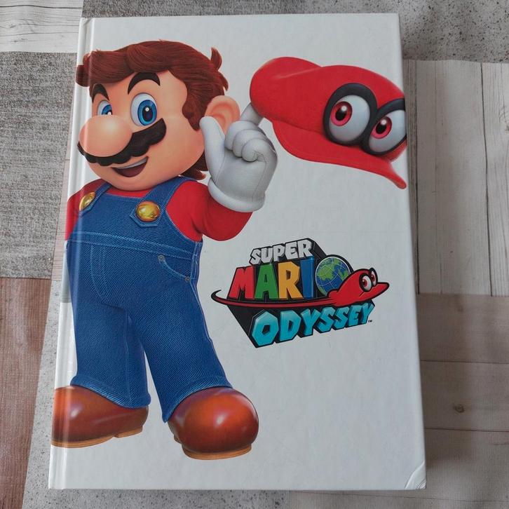 Guide à couverture rigide de l'édition Super Mario Odyssey L, Consoles de jeu & Jeux vidéo, Jeux | Nintendo Switch, Comme neuf