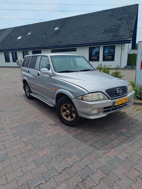 Ssangyong Musso 2.9TD van Automaat 4x4, Auto's, SsangYong, Bedrijf, Musso, 4x4, Trekhaak, Automaat, Grijs, Ophalen
