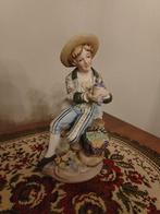 Porseleine beeldje: jongen met druiven, Ophalen