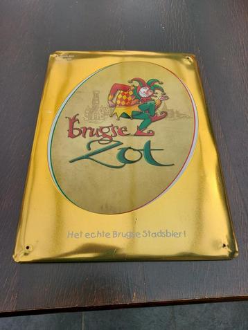 Metalen wandbord Brugse zot., Verzamelen, Biermerken, Ophalen, Gebruikt