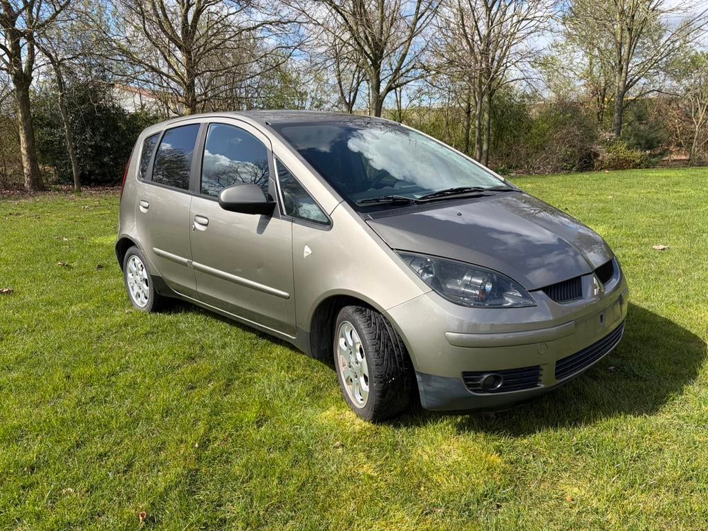 Mitsubishi colt diesel topstaat!, Auto's, Mitsubishi, Voorwielaandrijving, Zwart, Bruin, Colt