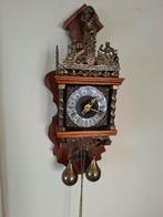 Zaanse klok, Ophalen