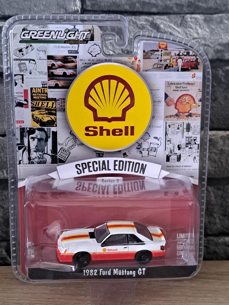 FORD MUSTANG GT SHELL 1/64ème, Auto, Nieuw, Ophalen of Verzenden, Greenlight