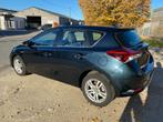 Toyota Auris HEV 1.8i HSD Comfort E-CVT, Auto's, Stof, 4 cilinders, Blauw, Bedrijf