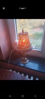 Tiffany lampje, Ophalen