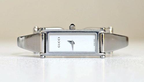 Gucci 1500L dameshorloge — Swiss Made + certificaat, Handtassen en Accessoires, Horloges | Dames, Gebruikt, Polshorloge, Staal