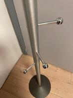 Porte manteau gris, Ophalen