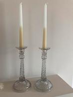 2 gjazen kandelaars, Ophalen