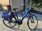 Elektrische dames fiets met draagtassen, Fietsen en Brommers, Elektrische fietsen, Ophalen of Verzenden, Zo goed als nieuw
