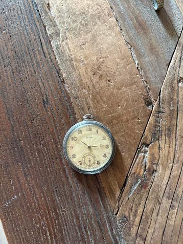 Oude Irisa zakHorloge  beschikbaar voor biedingen