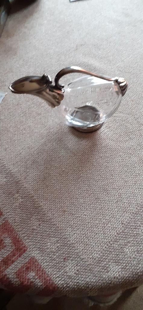 Glazen kruik, Ophalen