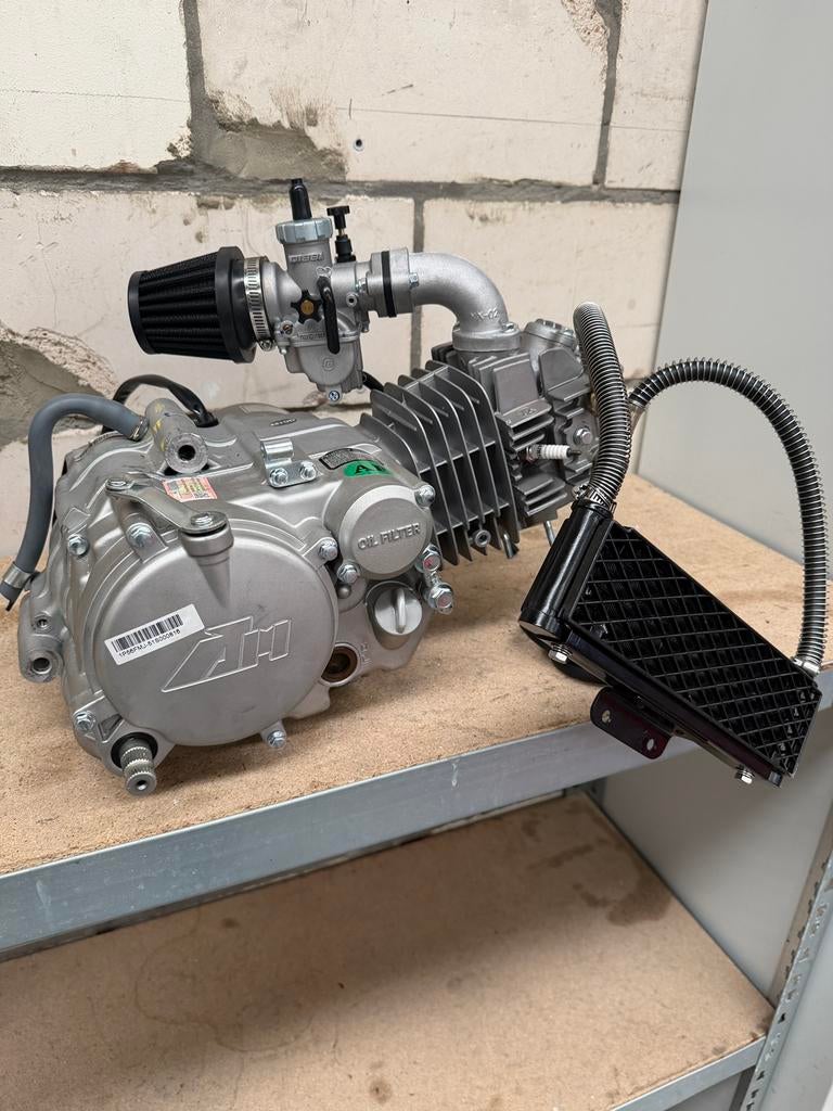 YX150cc motorblok + NIBBI carburateur en oliekoeler nieuw, Ophalen, Zo goed als nieuw, Carburateur