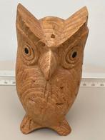 Houtsnijwerk UIL sculptuur decoratie, Ophalen