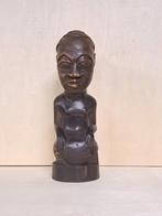statue de kuba africain en bois, Enlèvement