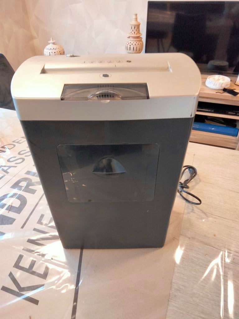 Voor kantoor versnipperaar, Ophalen