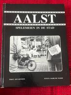Boek Aalst Jos Ghysens - Spelemeien in de stad, Boeken, Ophalen of Verzenden, Zo goed als nieuw