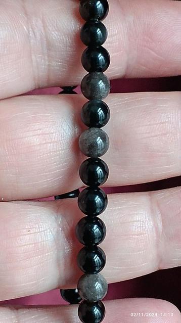 Elastische armband met gouden obsidiaankralen  beschikbaar voor biedingen