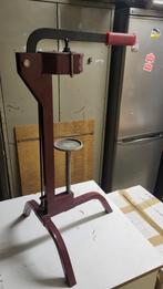 Bouchonneuse manuelle, Ophalen