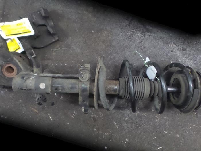 Schokdemperpoot links-voor van een Renault Laguna, Auto-onderdelen, Ophanging en Onderstel, Renault, Gebruikt, 3 maanden garantie