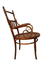 Josef Hofmann fauteuil van hout en riet, Ophalen
