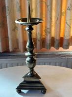 Antieke koperen kandelaar, Ophalen