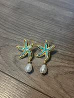 Zeesterren oorbellen met parel, Handtassen en Accessoires, Overige materialen, Ophalen of Verzenden, Goud, Met strass