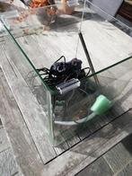 Aquarium met een aantal accessoires, Enlèvement