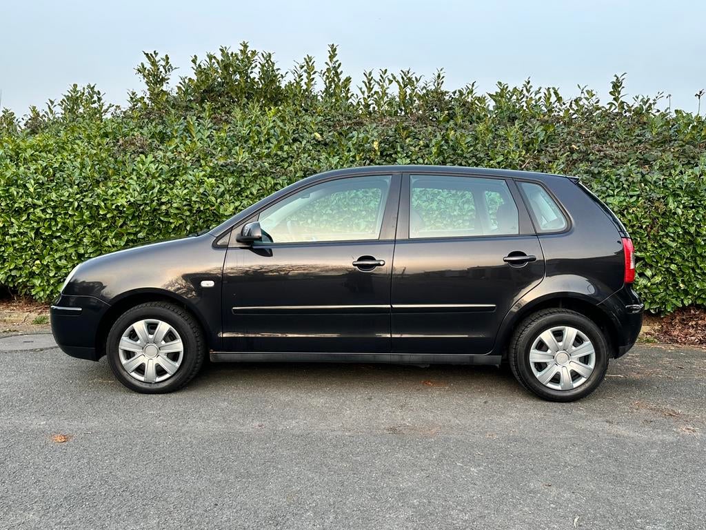 Volkswagen Polo Cricket Edition 1.2 Benzine 2005 €4 146.000k, Auto's, Voorwielaandrijving, Stof, Zwart, https://public.car-pass.be/vhr/d81b75a6-1d40-438e-a459-a61f62fb767e