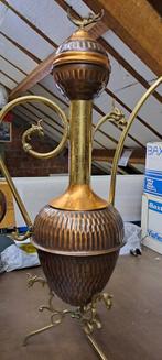 Koperen pot, Ophalen