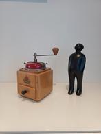 Vintage koffiemolen, Ophalen