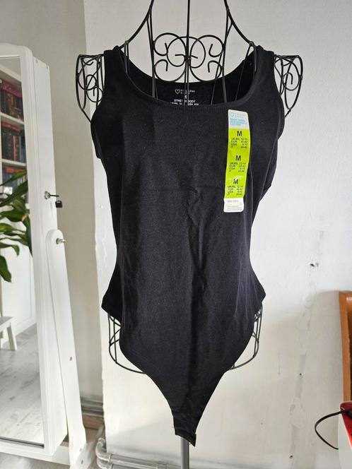 Nieuwe zwarte romper van Primark, maat M met drukknoopsluiti, Kleding | Dames, Topjes, Nieuw, Maat 38/40 (M), Zwart, Zonder mouw
